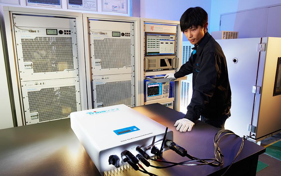 Technician operating Trinasolar technical equipment